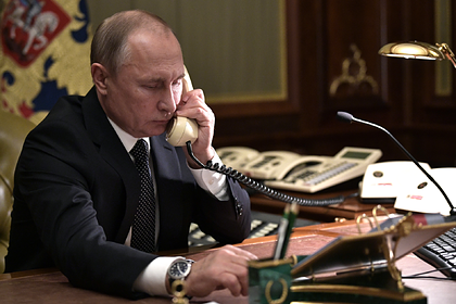Путин обсудил с Меркель Украину