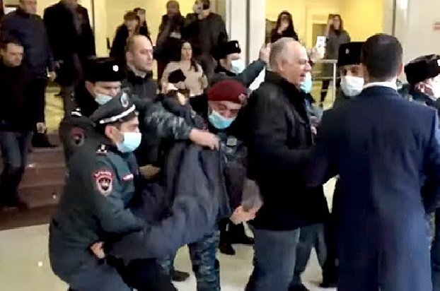Police brought 13 protesters outside the Armenian Foreign Ministry building